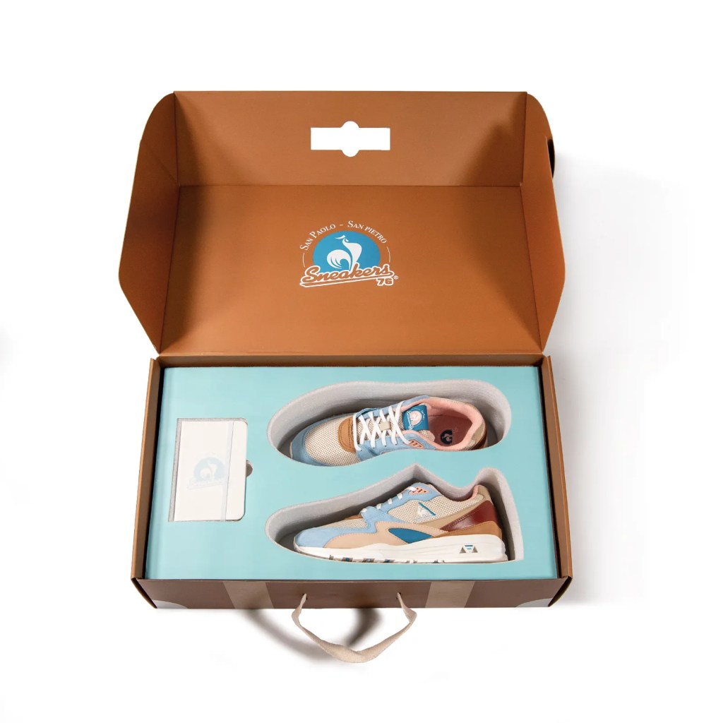 La boite de la paire de sneakers LCS en forme de valise